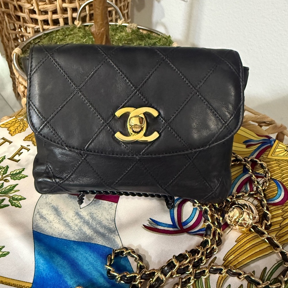 CHANEL Black Quilted Mini Bag with Gold Chain